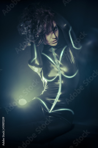 Future women concept, black latex with neon lights