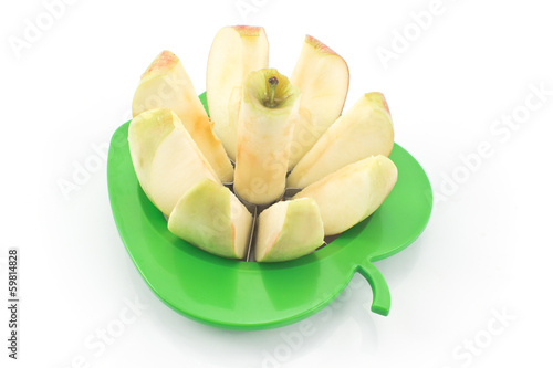 Fototapeta Apple with cutter isolated on white