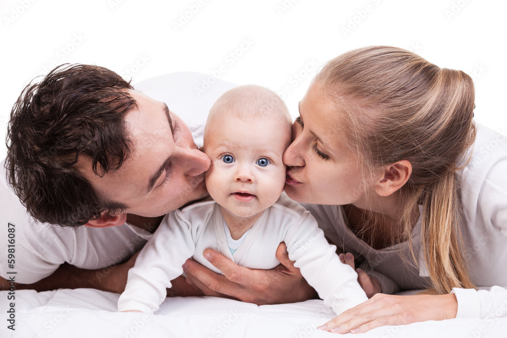 Closeup of young family with baby boy against white Closeup of young family with baby boy against white
