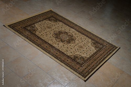 Persian Rug Isolated On Tiles