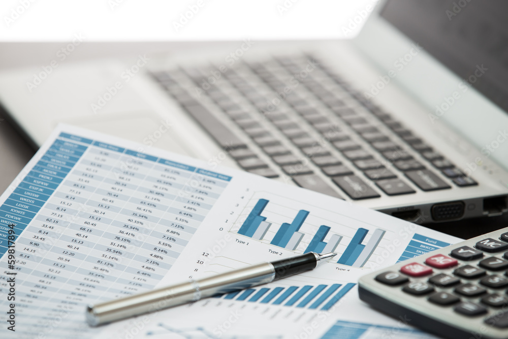 Businessman analyzing investment charts Businessman analyzing investment charts