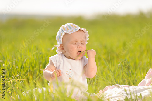 Child Eating Grass