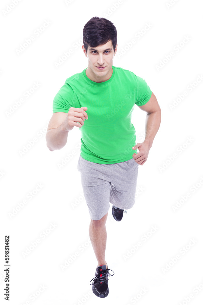 Athletic young man running, isolated over a white background Athletic young man running, isolated over a white background