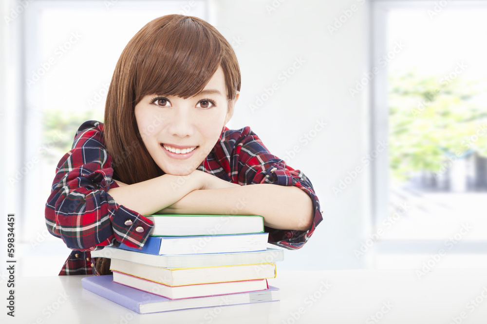 Happy young student girl at the classroom Happy young student girl at the classroom