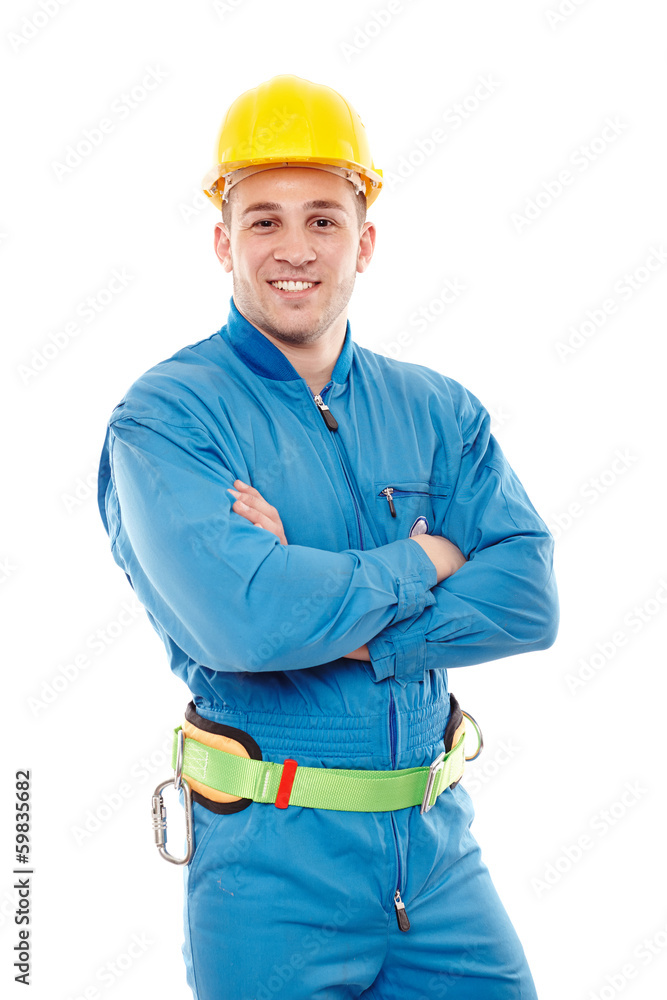 Young handsome worker with arms folded Young handsome worker with arms folded