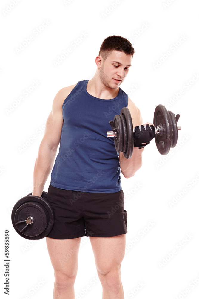 Handsome man working out with dumbbells Handsome man working out with dumbbells