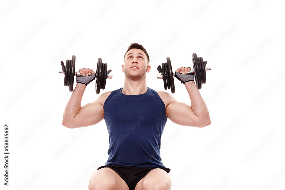 Young man working with dumbbells Young man working with dumbbells