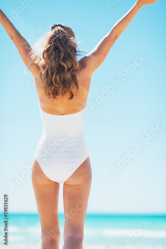 Young woman enjoying on beach