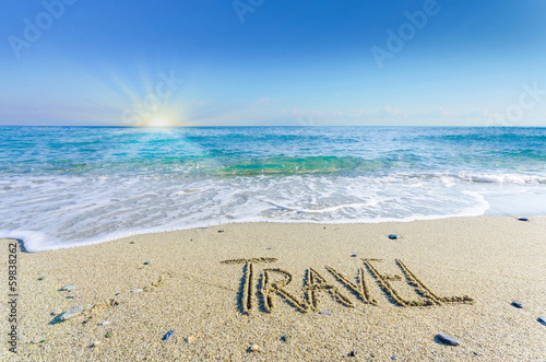 TRAVEL, creative abstract graphic message under sun sand
