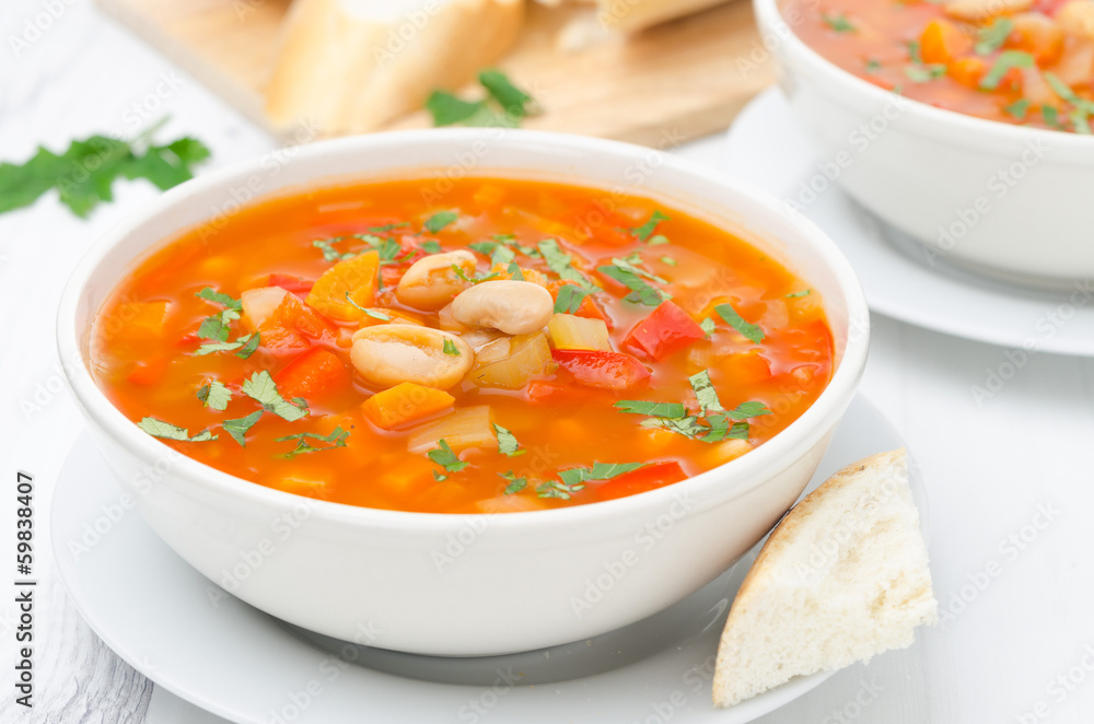 Vegetable soup with white beans in a bowl horizontal Vegetable soup with white beans in a bowl horizontal