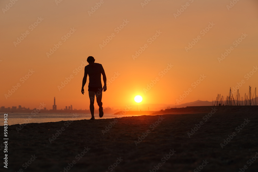Jogger silhouette walking exhausted after a hard training