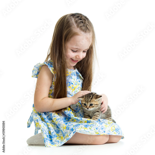 kid playing with Scottish k...