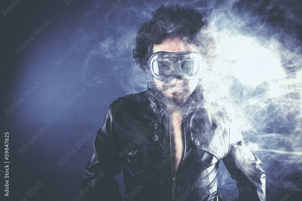 Smoke,Man with black shapes, studio portrait Smoke,Man with black shapes, studio portrait