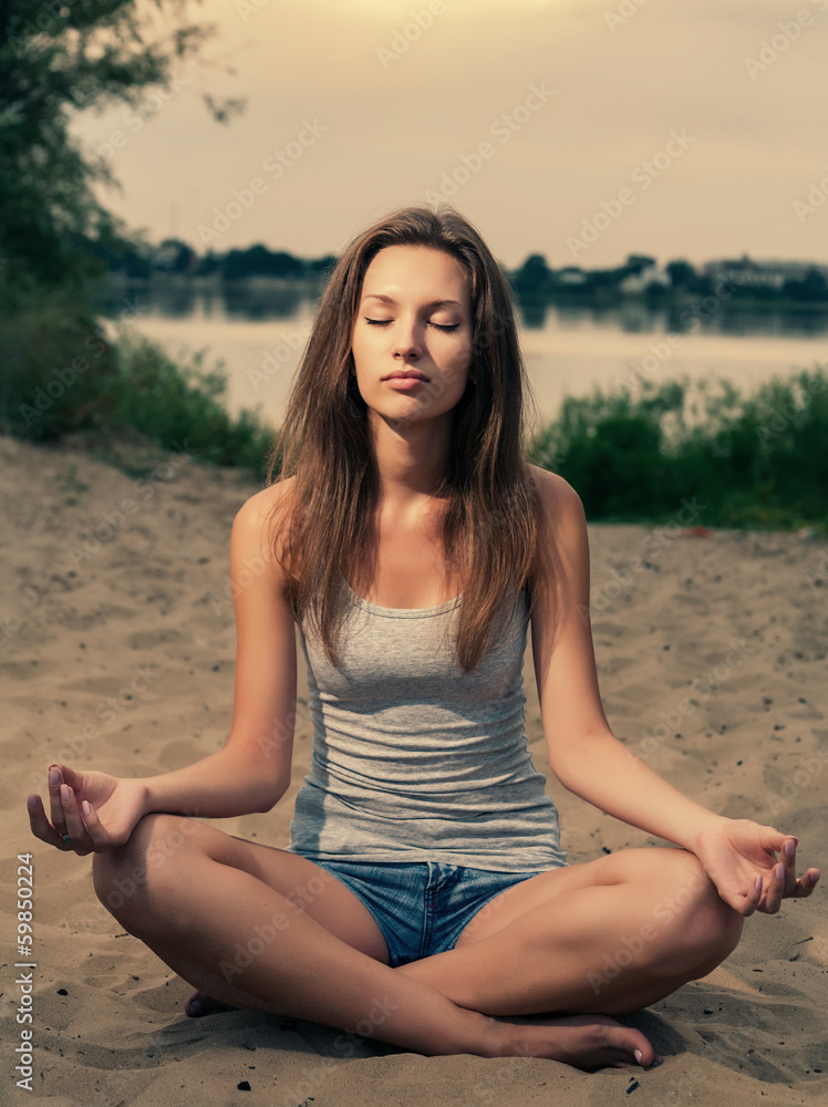 Fototapeta premium women river meditating