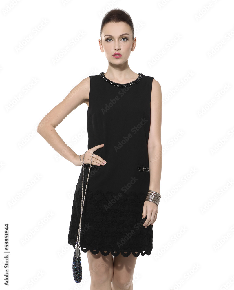 young woman in black dress with bag posing young woman in black dress with bag posing
