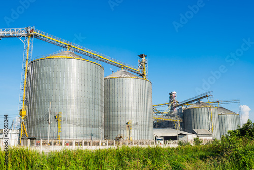 Canvas Print factory manufacture animal feed with blue sky