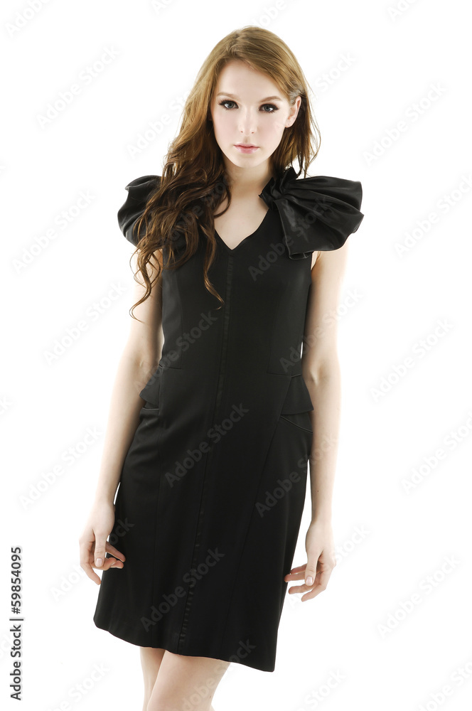 Young brunette lady in black dress posing Young brunette lady in black dress posing