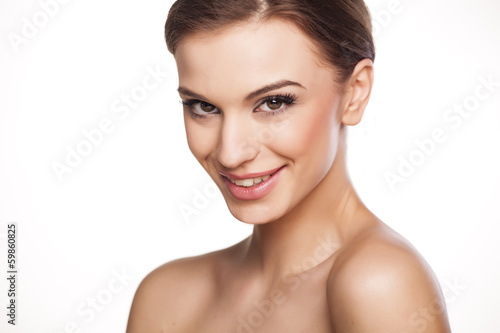 smiling beautiful girl posing on a white background