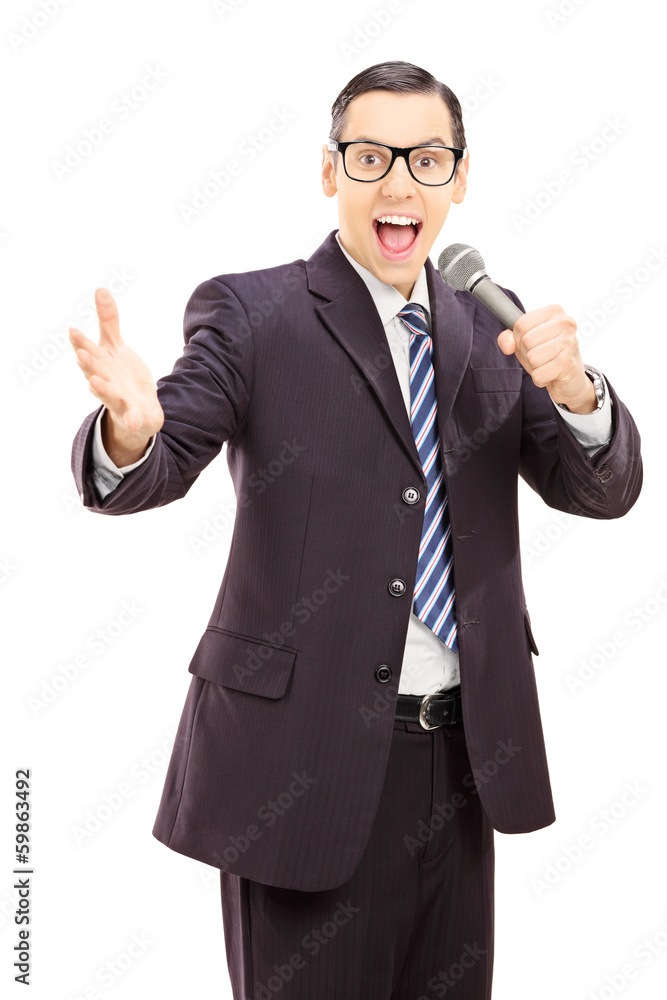 Professional male reporter in black suit holding a microphone Professional male reporter in black suit holding a microphone