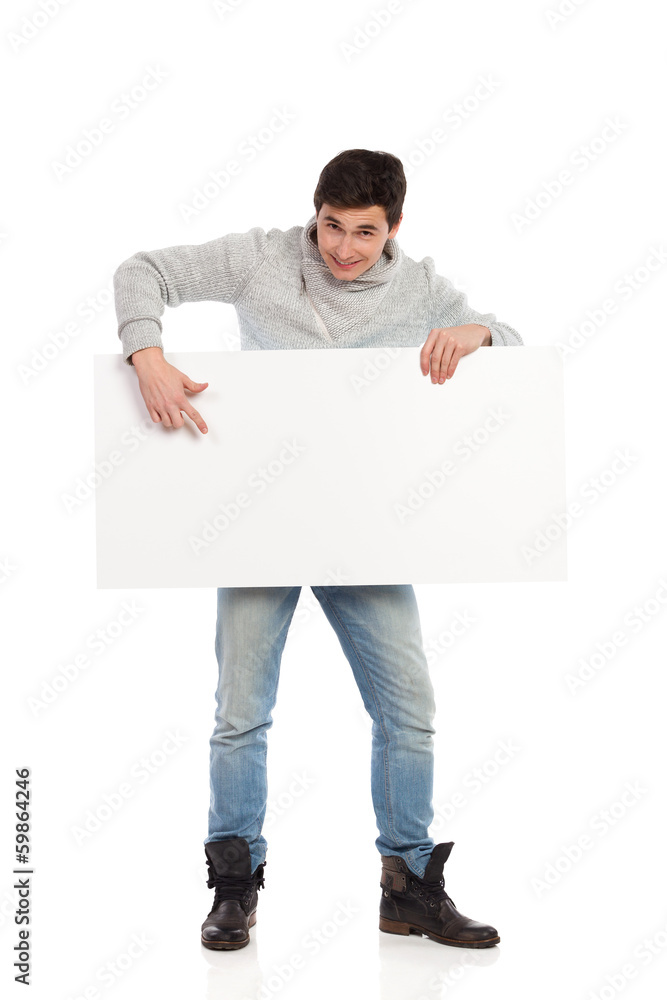 Male student with a banner. Male student with a banner.