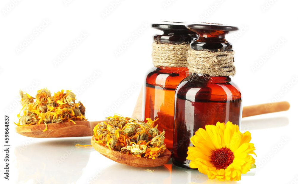 medicine bottles and calendula, isolated on white medicine bottles and calendula, isolated on white