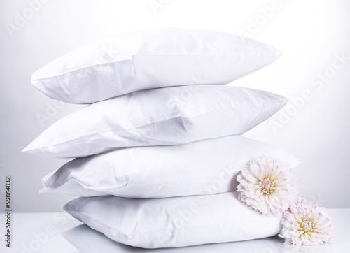 Fototapeta Naklejka Na Ścianę i Meble -  pillows and flowers, on grey background