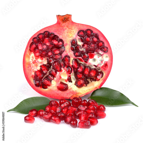 Pomegranate with leaves isolated on white