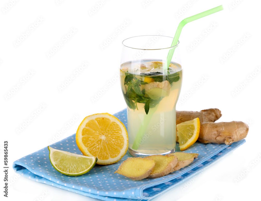 Glass of cold tea with ginger on napkin isolated on white Glass of cold tea with ginger on napkin isolated on white