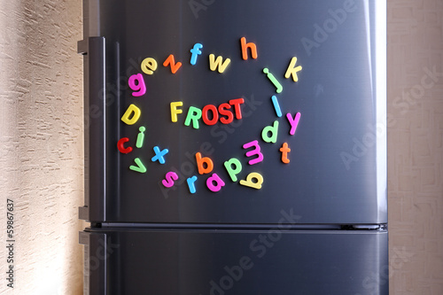 Word Frost spelled out using colorful magnetic letters