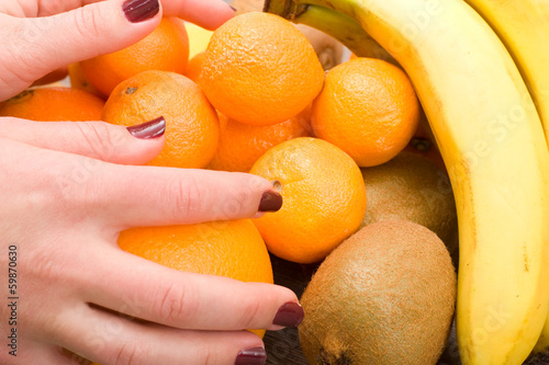 fruits and hand