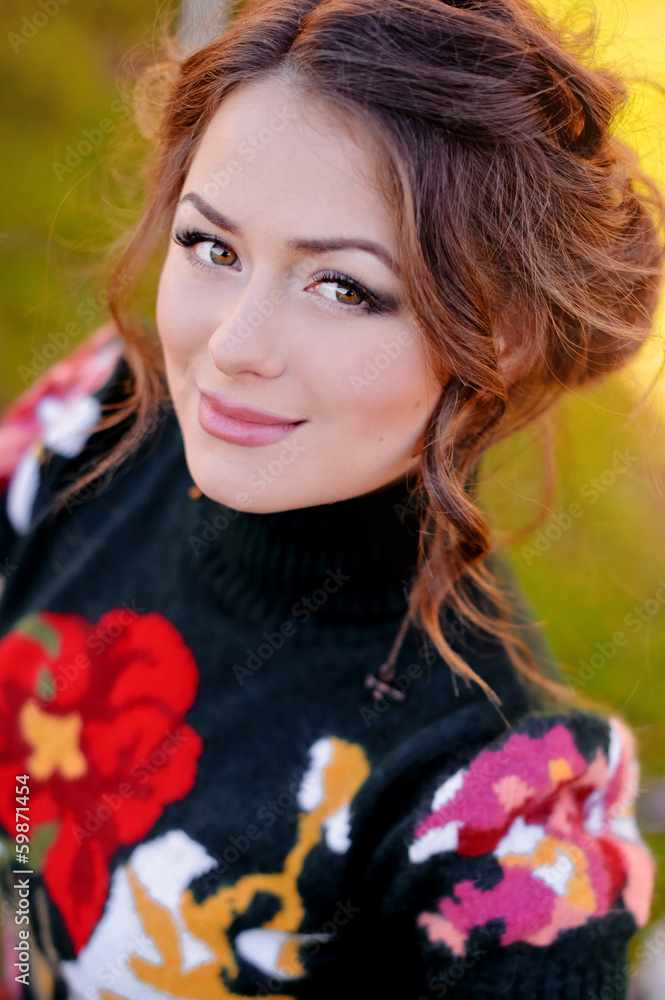Beautiful charming girl on green summer background.Closeup portr Beautiful charming girl on green summer background.Closeup portr