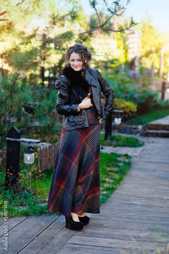 Portrait if young woman in park