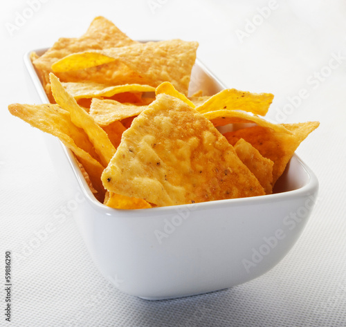 tortilla chips in white bowl