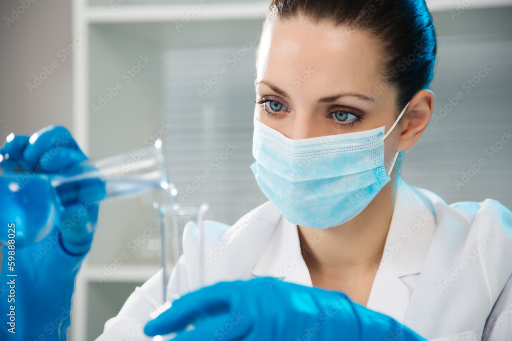 Female scientist working in laboratory Female scientist working in laboratory