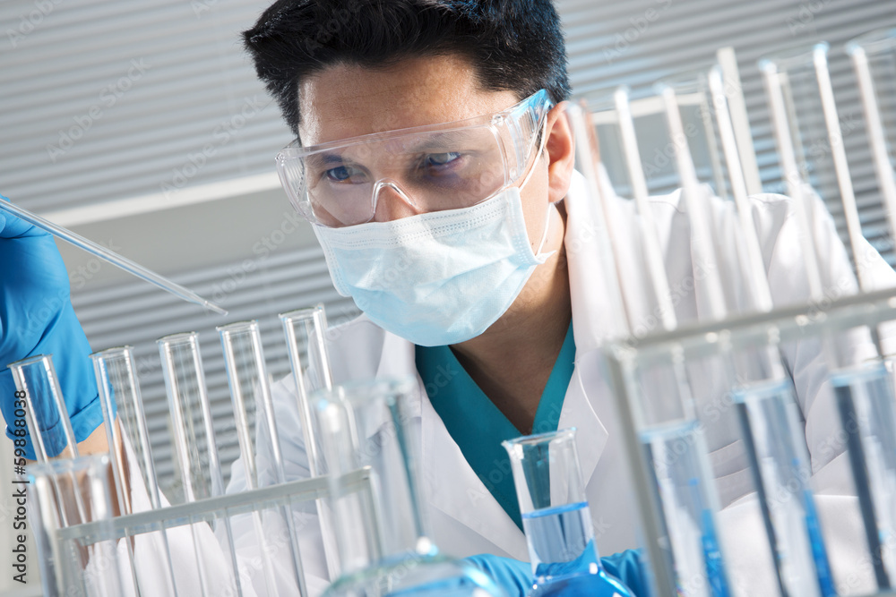 Medical scientist working in laboratory Medical scientist working in laboratory