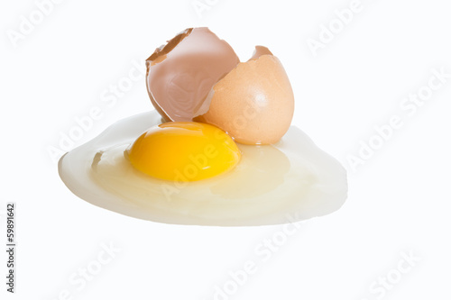 Raw broken egg isolated on white background