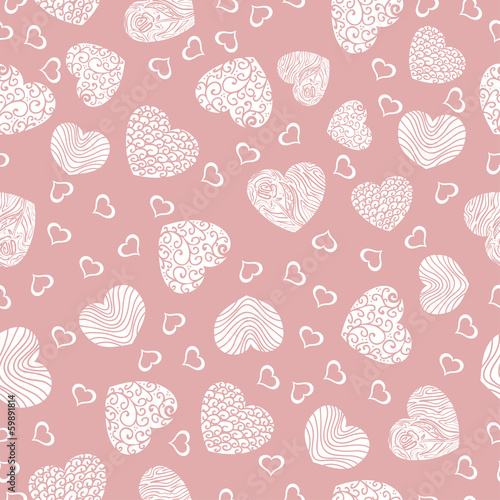Seamless pattern with white hearts on a pink background
