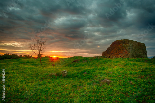 The nuraghe losa at the sunset photo