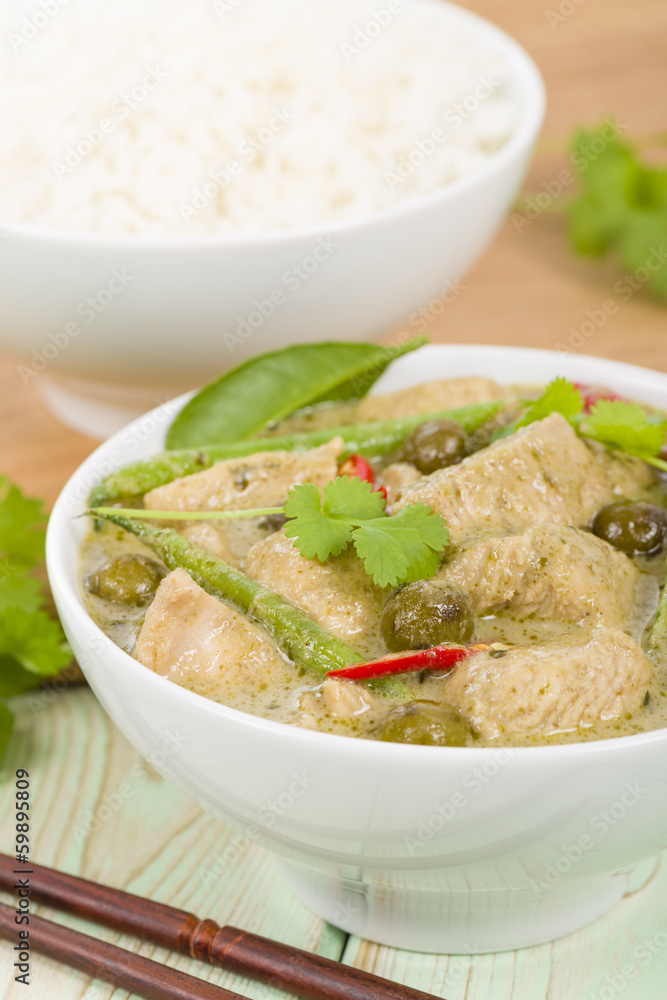 Thai green chicken curry with baby aubergines served with rice