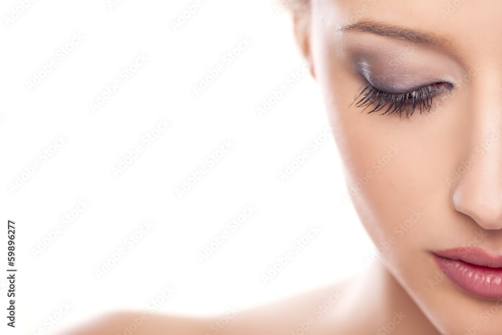 Fototapeta premium portrait of beautiful calm woman on white background
