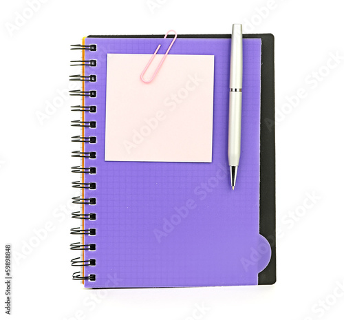 Notebook and pen isolated on white