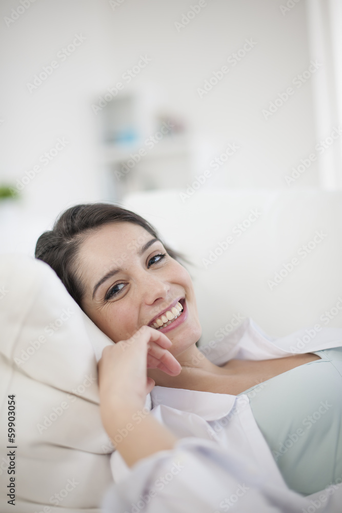 Gorgeous woman at home relaxing in living-room Gorgeous woman at home relaxing in living-room