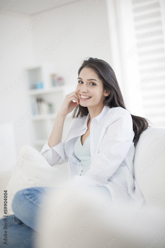 Gorgeous woman at home relaxing in living-room Gorgeous woman at home relaxing in living-room