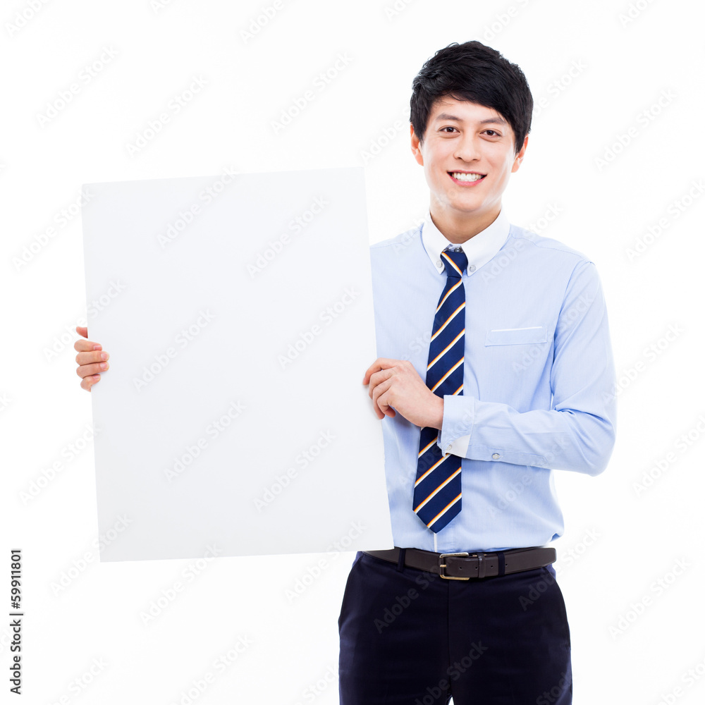 Young Asian business man holding a blank banner Young Asian business man holding a blank banner