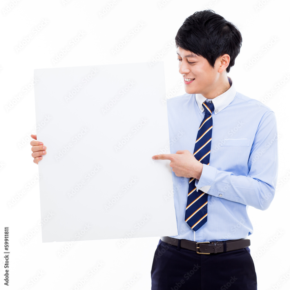 Young Asian business man holding a blank banner Young Asian business man holding a blank banner