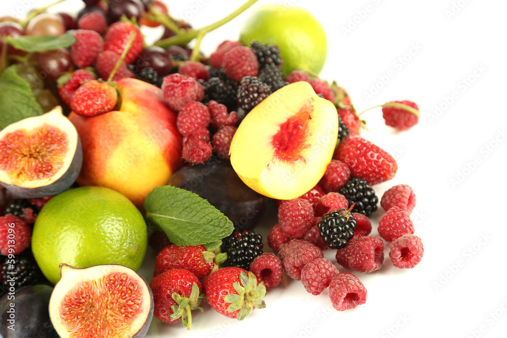 Assortment of juicy fruits and berries, isolated on white Assortment of juicy fruits and berries, isolated on white