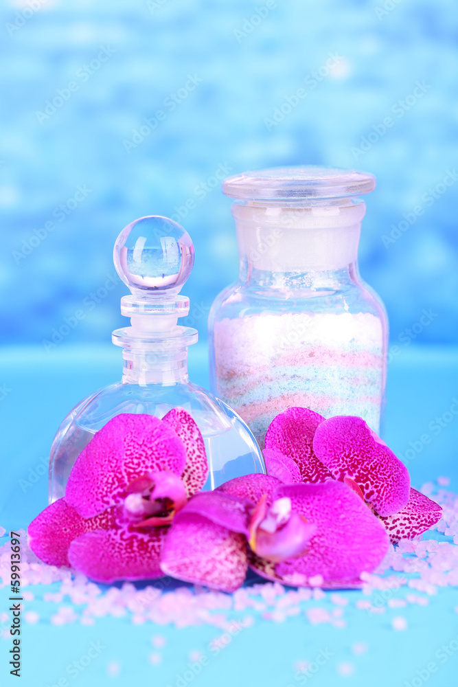 Beautiful spa setting with orchid on blue background Beautiful spa setting with orchid on blue background
