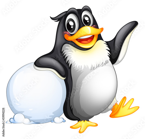 A penguin beside a ball