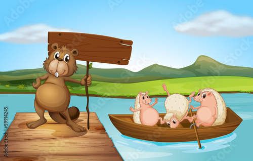 A beaver at the port holding an empty signboard