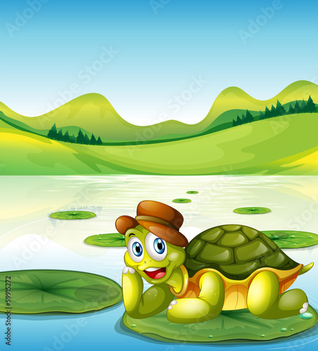 Fototapeta Naklejka Na Ścianę i Meble -  A happy turtle above the floating waterlily